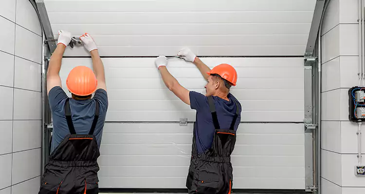 Garage Door Bottom Panel Repair in Sebastian, FL